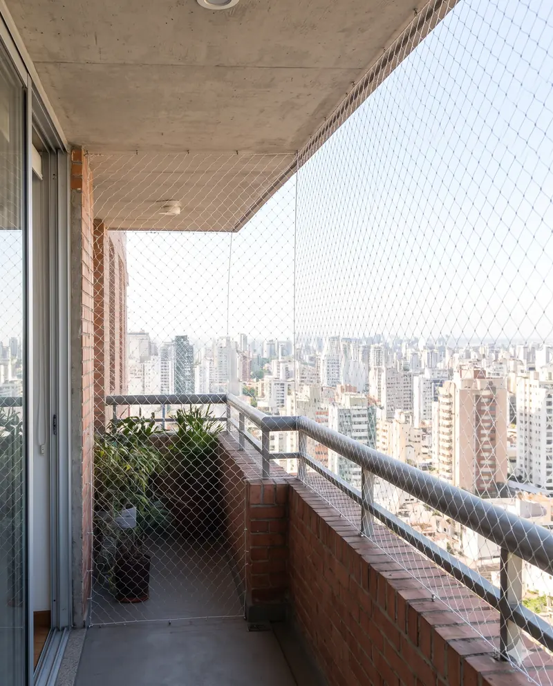 Apartment balcony covered with a pigeon safety net installed in Coimbatore
